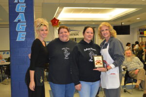 Best Sauce: Papa’s Pizza Place (Woodridge) with District 99 Education Foundation board member and Pizza Wars event chair Martha Merilos